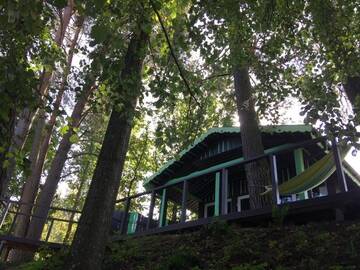 Фото номера Дом с 1 спальней Дома для отпуска VIP Green House of Hope for 2 г. Leliūnai 35