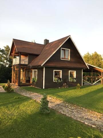 Фото номера Дом с 4 спальнями Загородные дома Kaimo turizmo sodyba Geras г. Leliūnai 8